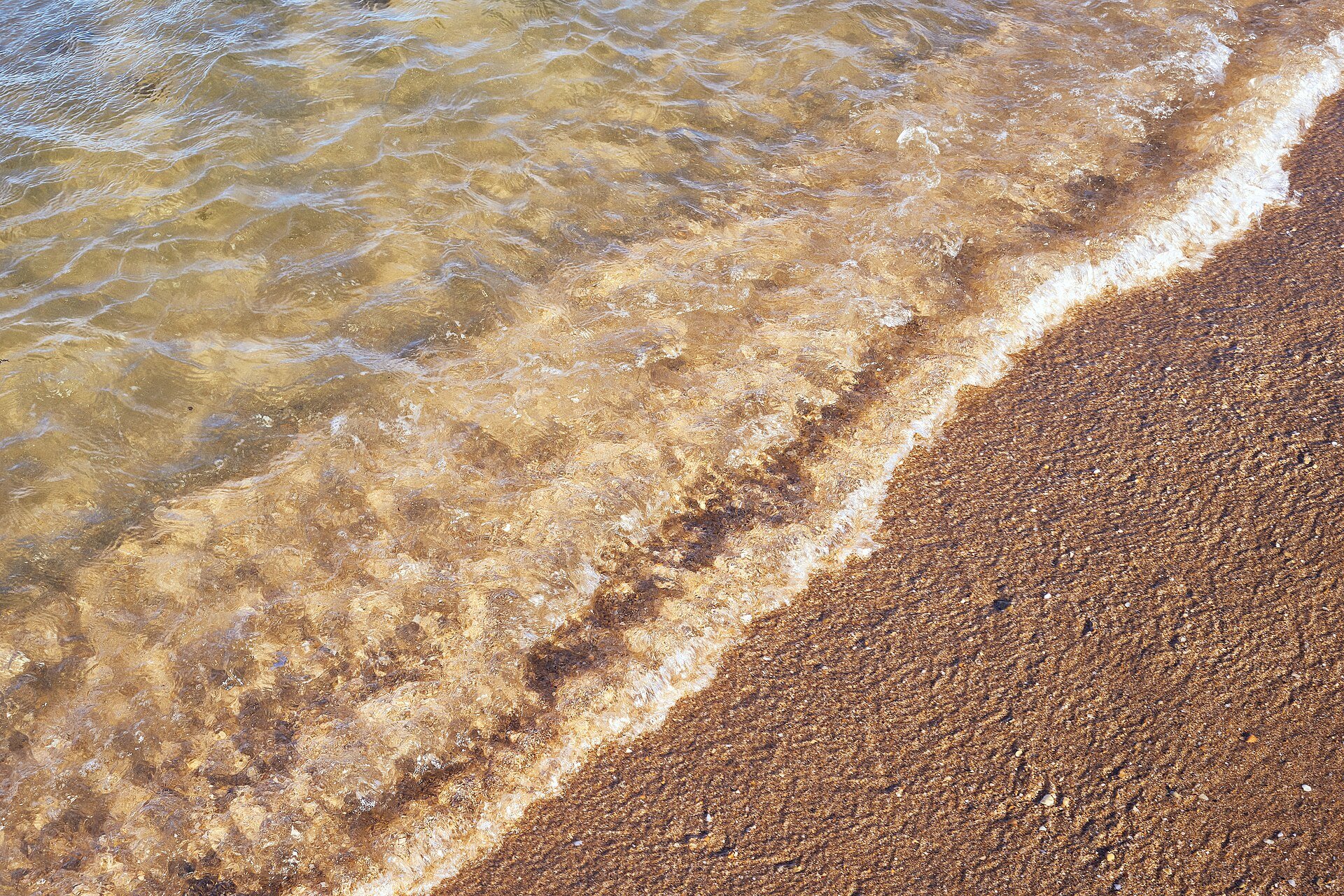 Clean water on a beach of Lagos, Portugal.