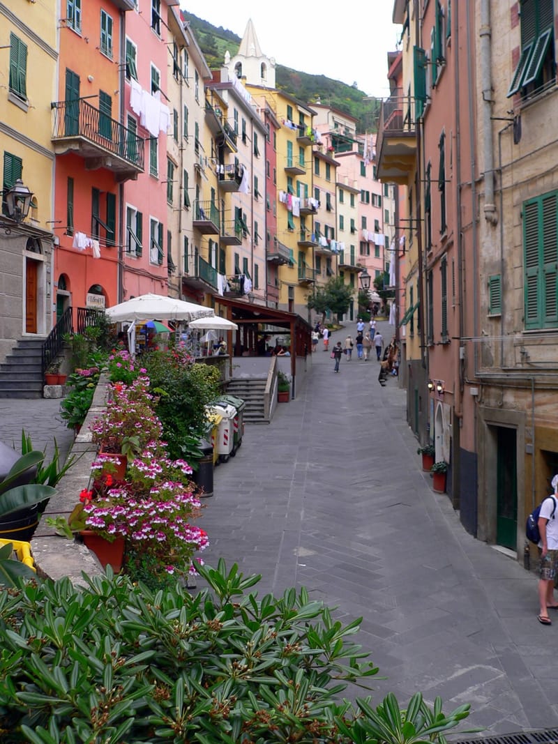 A narrow street between colourful buildings in Riomaggiore.